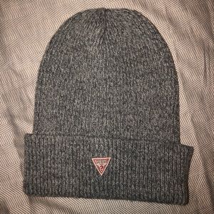 A gray Guess beanie